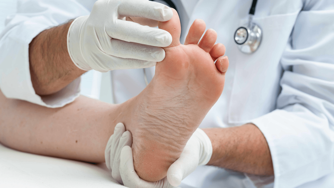 examination of the skin of the legs during an appointment with a specialist